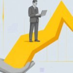 AI Tools For Affiliate Marketers: grayscale businessman reading laptop on a 3D arrow graph held by a hand.